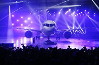 Самолет МС-21 с российскими двигателями ПД-14 совершил первый полет - Транспорт Церемония выкатки магистрального самолета МС-21-300 на Иркутском авиационном заводе корпорации