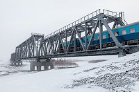 РЖД рассказали о перспективах развития БАМа - Транспорт Пассажирский состав на железнодорожном мосту