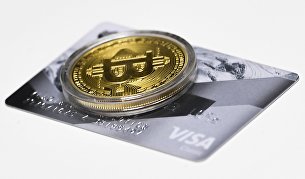 Российские форекс-дилеры просят разрешить им работать с криптоактивами - Валюта Сувенирная монета криптовалюты биткойн