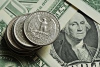 Зачем Америка "топит" доллар и разгоняет инфляцию - Валюта Монеты различного номинала и банкноты доллара США