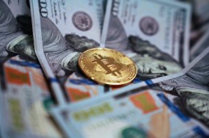 Глава Binance в РФ рассказал, останется ли биткоин главной криптовалютой - Криптовалюты Монета с логотипом криптовалюты биткоин