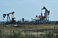Российский рынок акций снизился за день, но ощутимо вырос за месяц - Индексы Добыча нефти в пригороде Баку