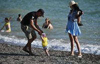 Родители российских школьников начнут получать выплаты к 1 сентября - Макроэкономика Город Саки в Крыму в преддверии курортного сезона