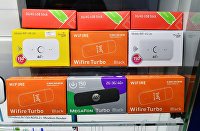 Эксперт ждет продолжения гонки за 6G - Телеком Wi-Fi роутеры на полке магазина
