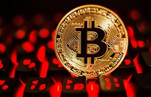 Эксперт оценил законопроект Минфина по криптовалютам в России - Криптовалюты Монета с логотипом криптовалюты биткоин